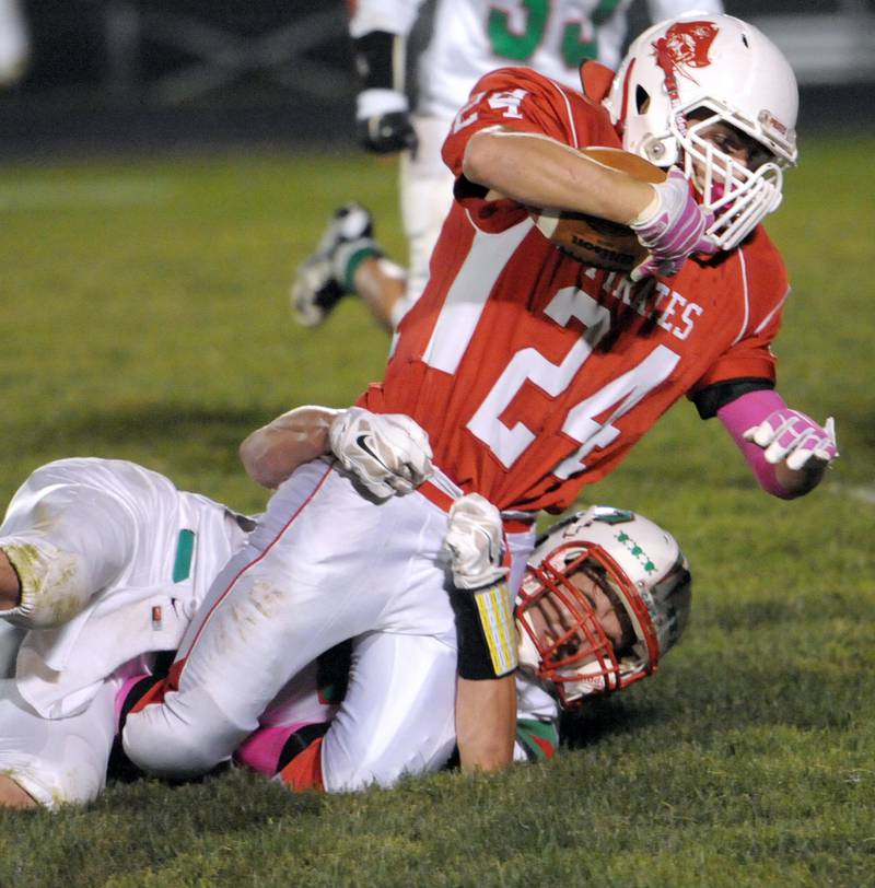 Ottawa's Weston Hoffman is brought down by a La Salle-Peru defender in the 2014 game.