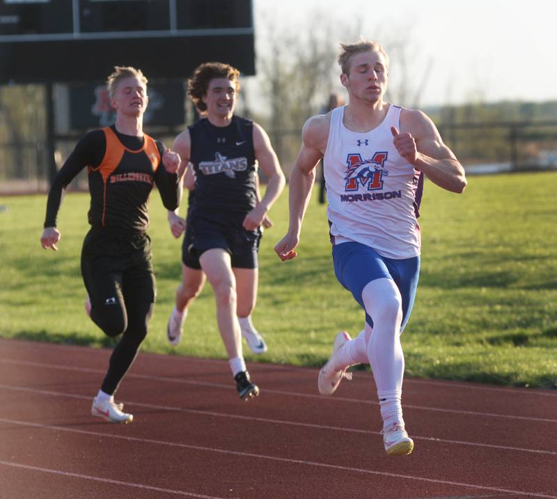 Morrison's Brady Anderson leads the pack to the finish line in the 100 hurdles at the Ed Schmidt Invitational Track Meet at Erie High School on Friday, April 19, 2024.