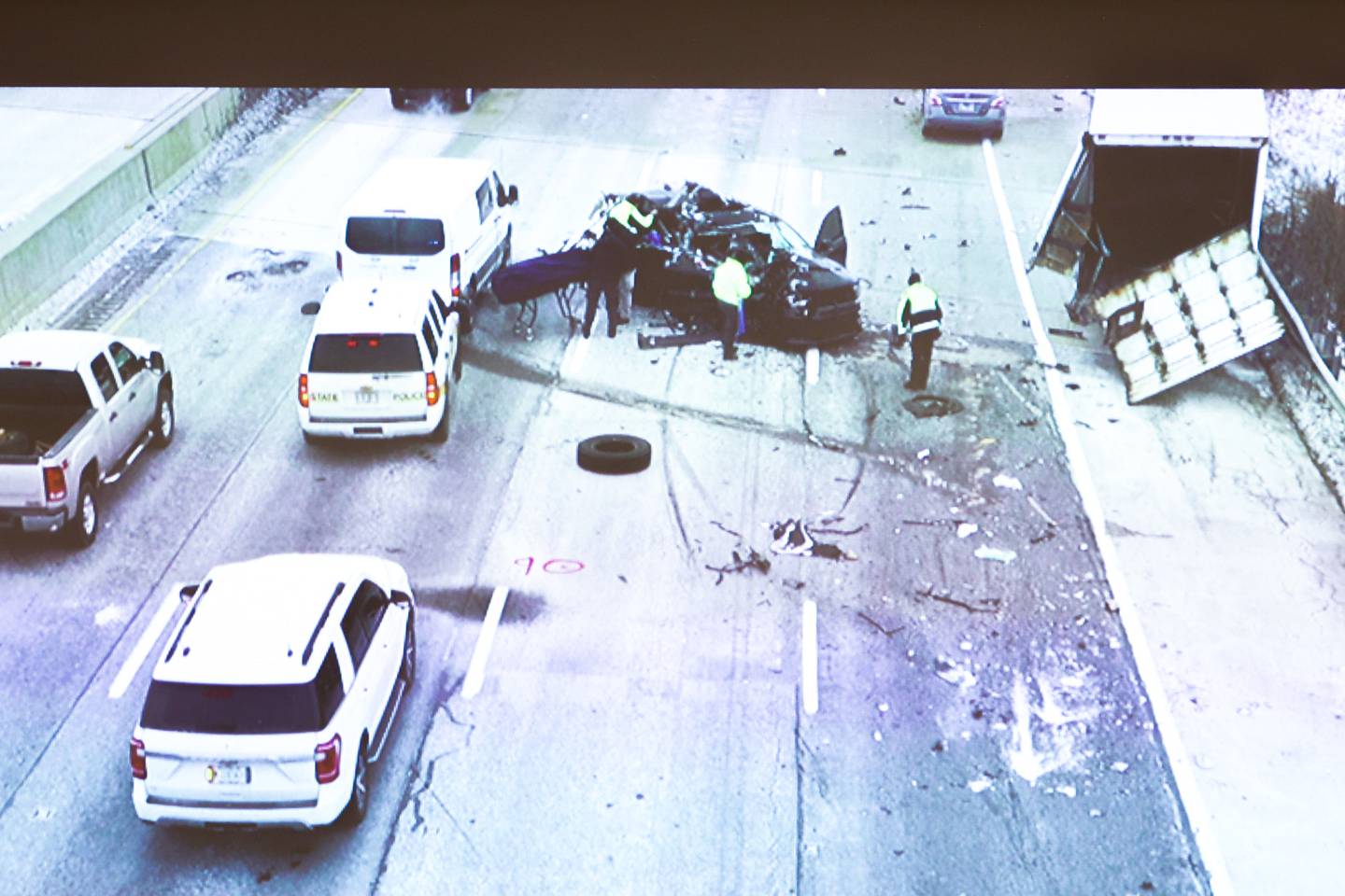 A drone photo is shown of the wreckage of the vehicle, center, driven by the defendant, Erin Zilka, and the box truck she hit during the Zilka trial at the Will County Courthouse on Wednesday, June 28th, 2023 in Joliet. The former Joliet police officer Erin Zilka is on trial on aggravated DUI charges following a deadly 2020 crash where her passenger, Berwyn police officer Charles Schauer, 33, of Glen Ellyn, was killed.