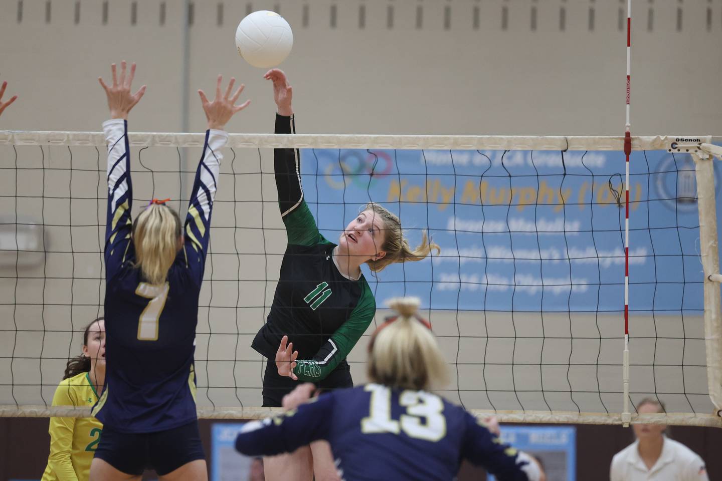 Providence’s Abbey Knight stretches for the shot against Lemont in the Class 3A Providence Sectional semifinal on Monday.