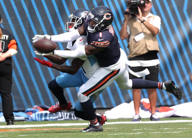 Chicago Bears cornerback Jaylon Johnson almost intercepts a pass intended for Tennessee Titans wide receiver Calvin Ridley during their game Sunday, Sept. 8, 2024, at Soldier Field in Chicago.