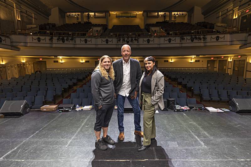 Dixon Historic Theatre technical director Scott Shipp, new chairman Mike Venier and board member Jessica Dempsey are seen on stage Thursday, Oct. 19, 2023. An event this weekend will bring films and live music to The Dixon.