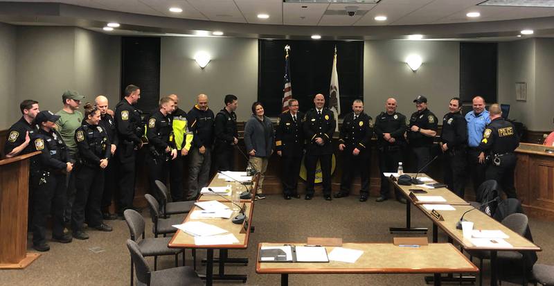 Peru police officers gather in the Council chambers to celebrate the promotion of John Atkins and Art Smith Monday, Feb 27, 2023.