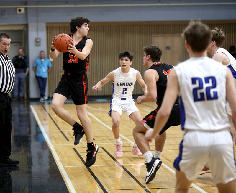 Wheaton Warrenville South’s Luca Carbonaro grabs the ball from going out of bounds during a Class 4A Willowbrook Regional semifinal game against Geneva on Wednesday, Feb. 21, 2024.