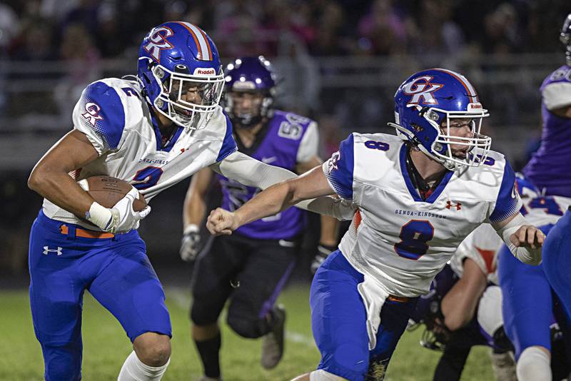 Genoa-Kingston’s Tyler Atterberry follows his blockers  Thursday, Sept. 14, 2023 in a game at Dixon High School.