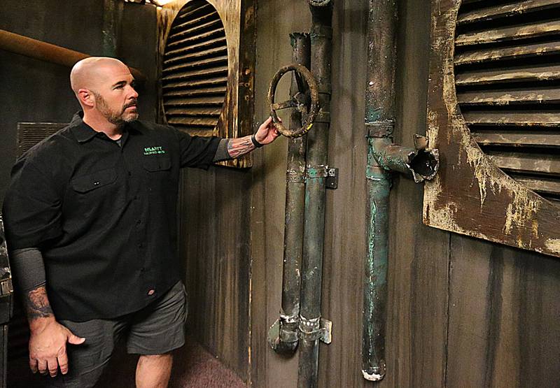 Pete Pavia, owner of the Insanity Haunted House, poses in the boiler room inside the Peru Mall on Thursday, Oct. 6, 2022.