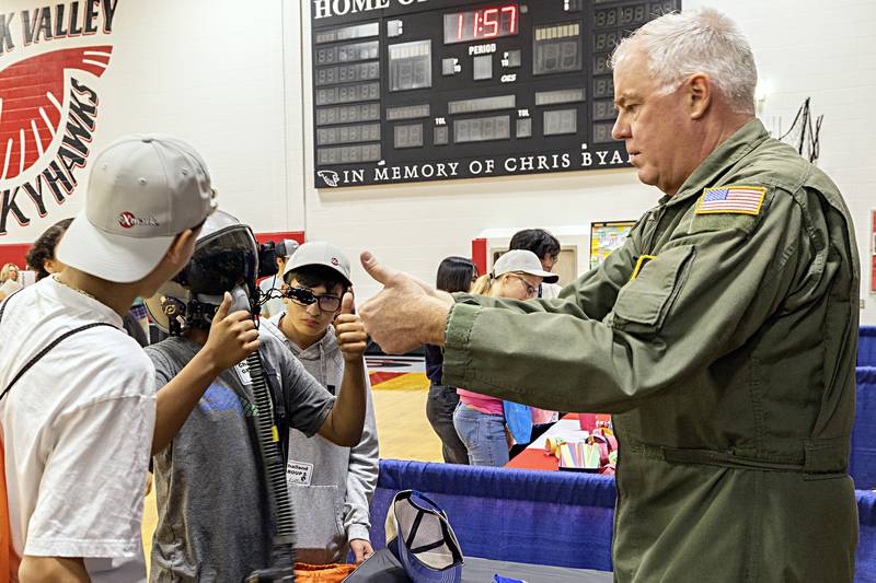 Pilot Tom Kittler gets a thumbs up from Treyvion Durham Friday, Oct. 20, 2023 during the Pathways Playground event at SVCC.