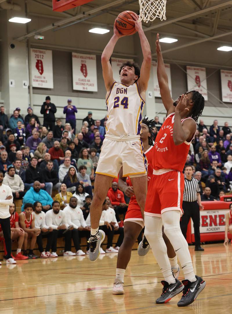 Downers Grove North’s Aidan Akkawi (24) goes up to the basket against Homewood-Flossmoor’s Bryce Heard (2) during the When Sides Collide Shootout on Saturday, Jan. 20, 2024 in Lisle, IL.