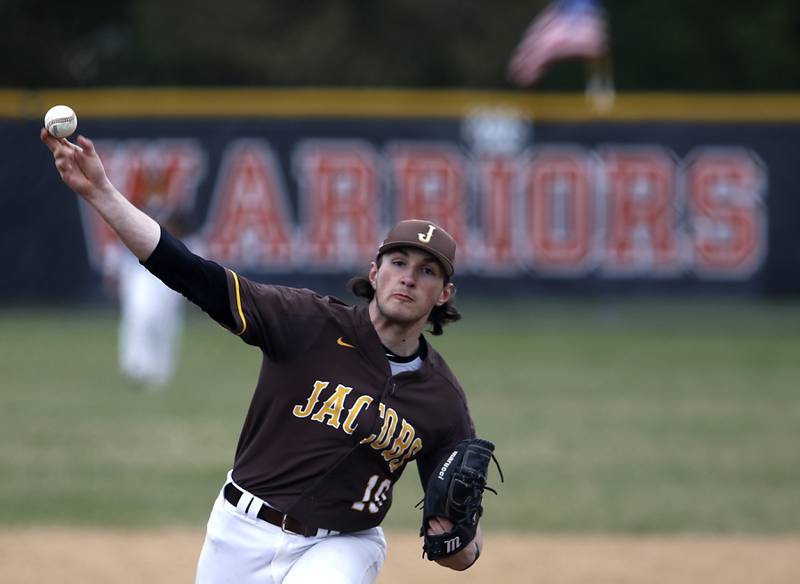 Jacobs’s Grant Helbig throws a pitch during a Fox Valley Conference baseball game Friday, April 15, 2022, between Jacobs and McHenry at Petersen Park in McHenry.