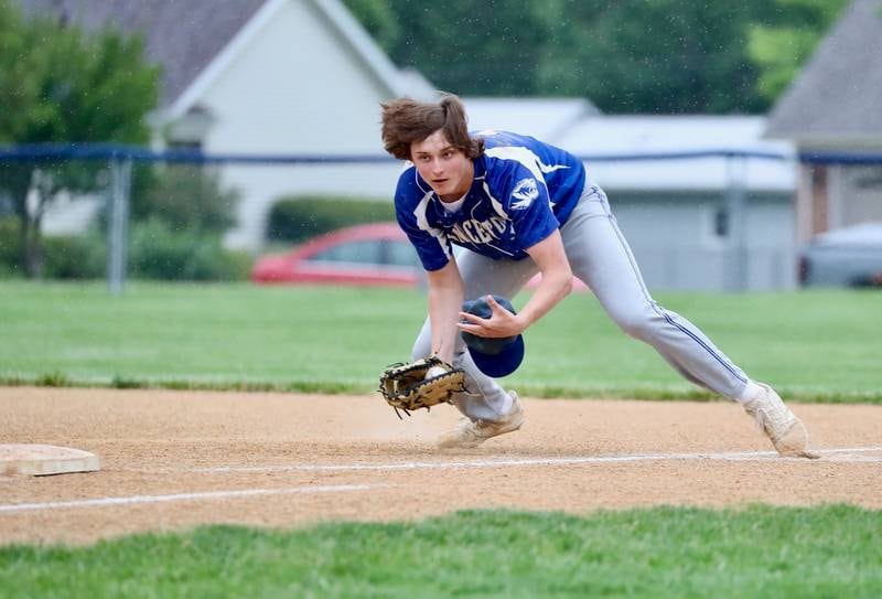 Princeton's Luke LaPorte fields a hard hit ball down the first base line on Monday, May 13, 2024 in Princeton.