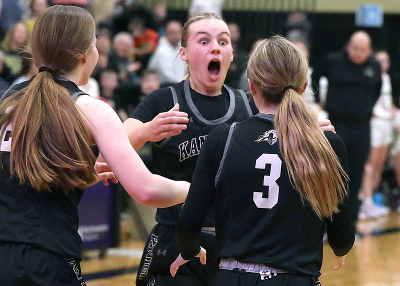 Kaneland players celebrate their win over Sycamore in their Class 3A sectional semifinal Tuesday, Feb. 20, 2024, at Sycamore High School.