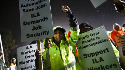 Dockworkers go on a strike that could reignite inflation and cause shortages in the holiday season