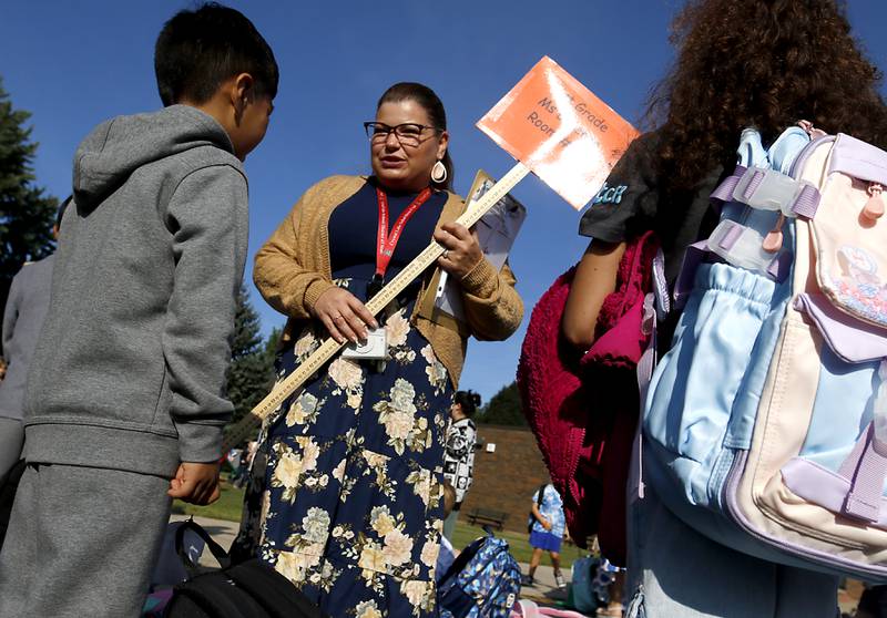 First-grade teacher Brandy Lorenzo talks with her students on the first day of school on Wednesday, Aug. 21, 2024, at Coventry Elementary School in Crystal Lake.