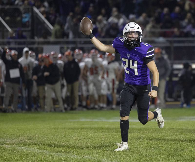 Dixon’s Carter Kibble comes up with a fumble against Byron Friday, Oct. 18, 2024, at A.C. Bowers Field in Dixon.