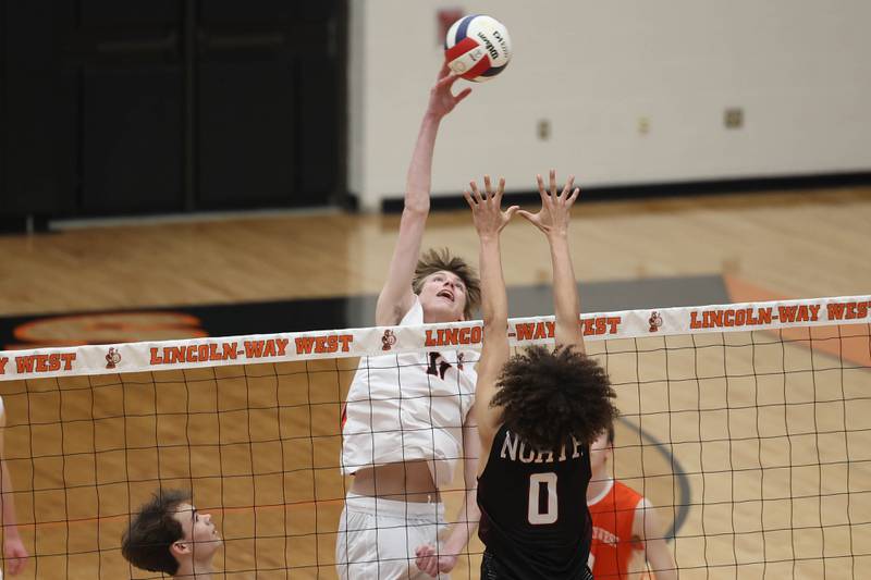 Lincoln-Way West’s Drew Kregul stretches for the shot against Plainfield North on Monday, March 18, 2024 in New Lenox.