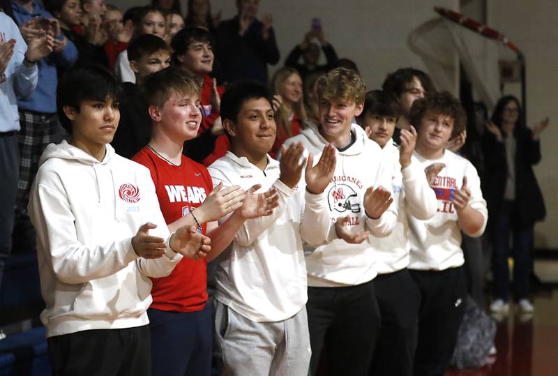 Students clap for the team as Marina Central honors their wrestlers that brought home the IHSA Class 1A Dual Team State Championship title on Friday, March 8, 2024, during a celebration at the high school in Woodstock.