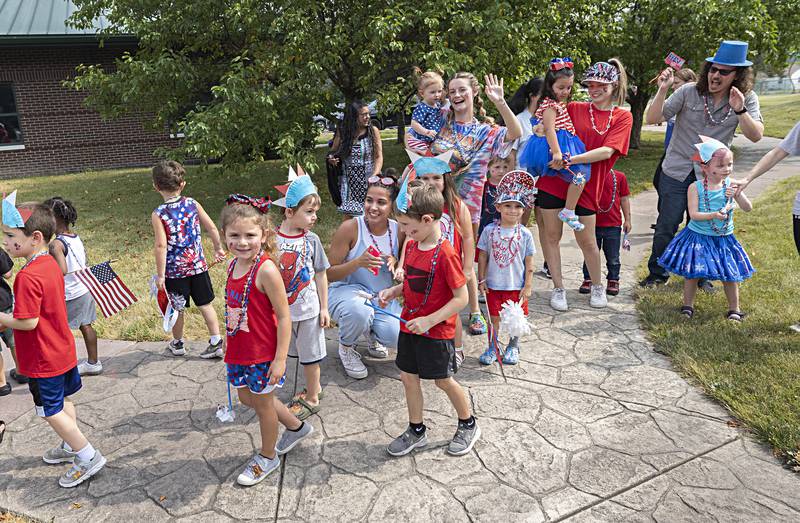 Sterling Rock Falls Child Care held their annual Fourth of July parade on the grounds of the facility Thursday, June 29, 2023. Kids wore red, white and blue and other patriotic decor as they marched past parents and grandparents.
