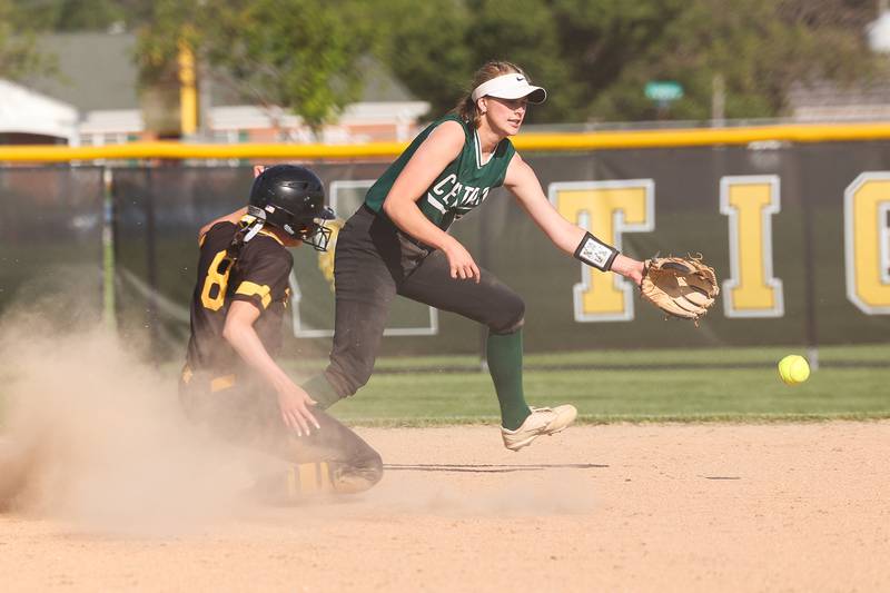 Plainfield Central’s Jamie Crawford can’t field the wild throw on the steal by Joliet West’s Shelby Fraser on Wednesday, May 15, 2024 in Joliet.