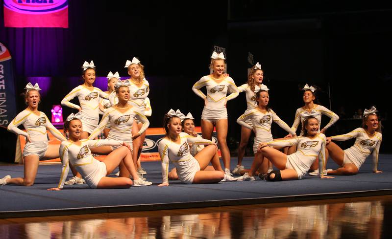 Members of the Jacobs High School cheer team perform during the IHSA Cheer State Finals in Grossinger Motors Arena on Saturday, Feb. 4, 2023 in Bloomington.