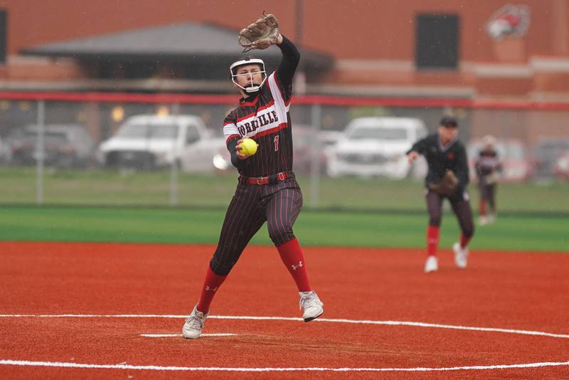 Yorkville's Peyton Levine (7) delivers a pitch against Oswego during a softball game at Yorkville High School on Thursday, May 9, 2024.