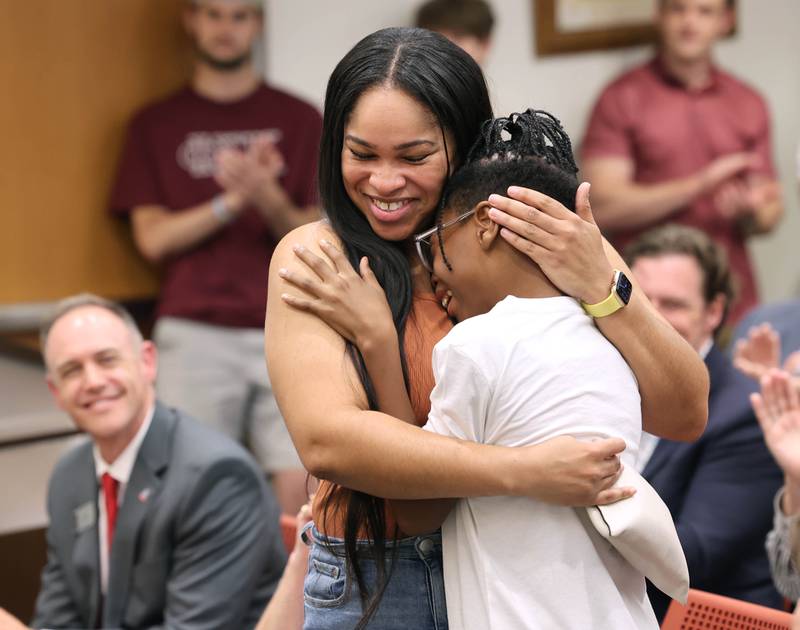 Elijah Livingston and his mom Shannon Gardner react after learning Elijah’s wish was granted by Make-A-Wish Illinois Monday, July 10, 2023, during the DeKalb City Council meeting. Livingston also received a key to the city from Mayor Cohen Barnes.