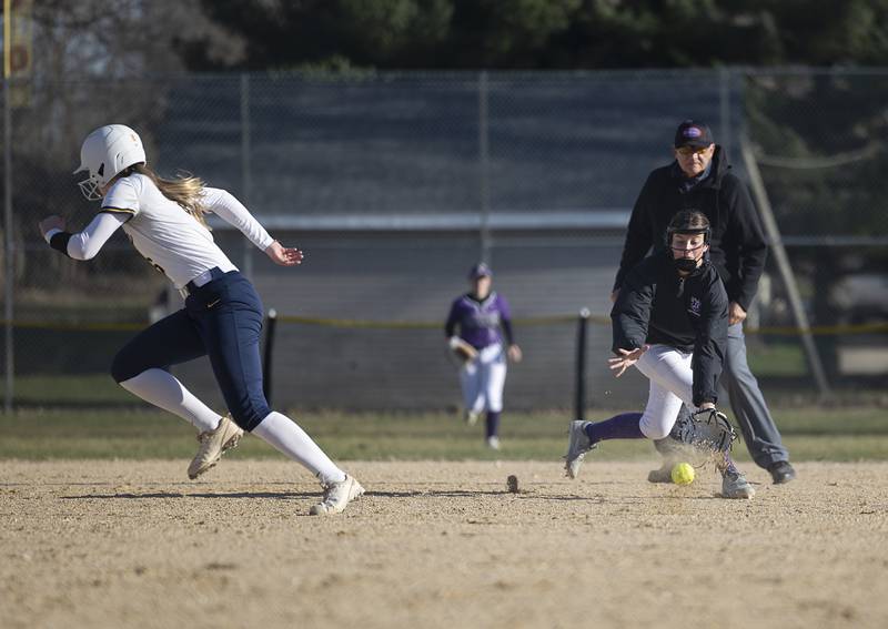 Dixon’s Kennedy Haenitsch moves to get in front of a ground ball against Sterling Tuesday, March 19, 2024 in Dixon.