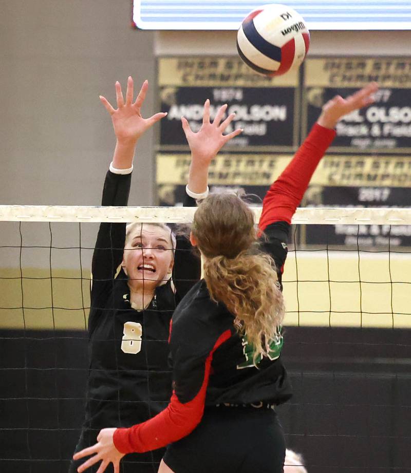 Sycamore's Ava Carpenter tries to block the spike of LaSalle-Peru's Katie Sowers during their match Tuesday, Oct. 10, 2023, at Sycamore High School.