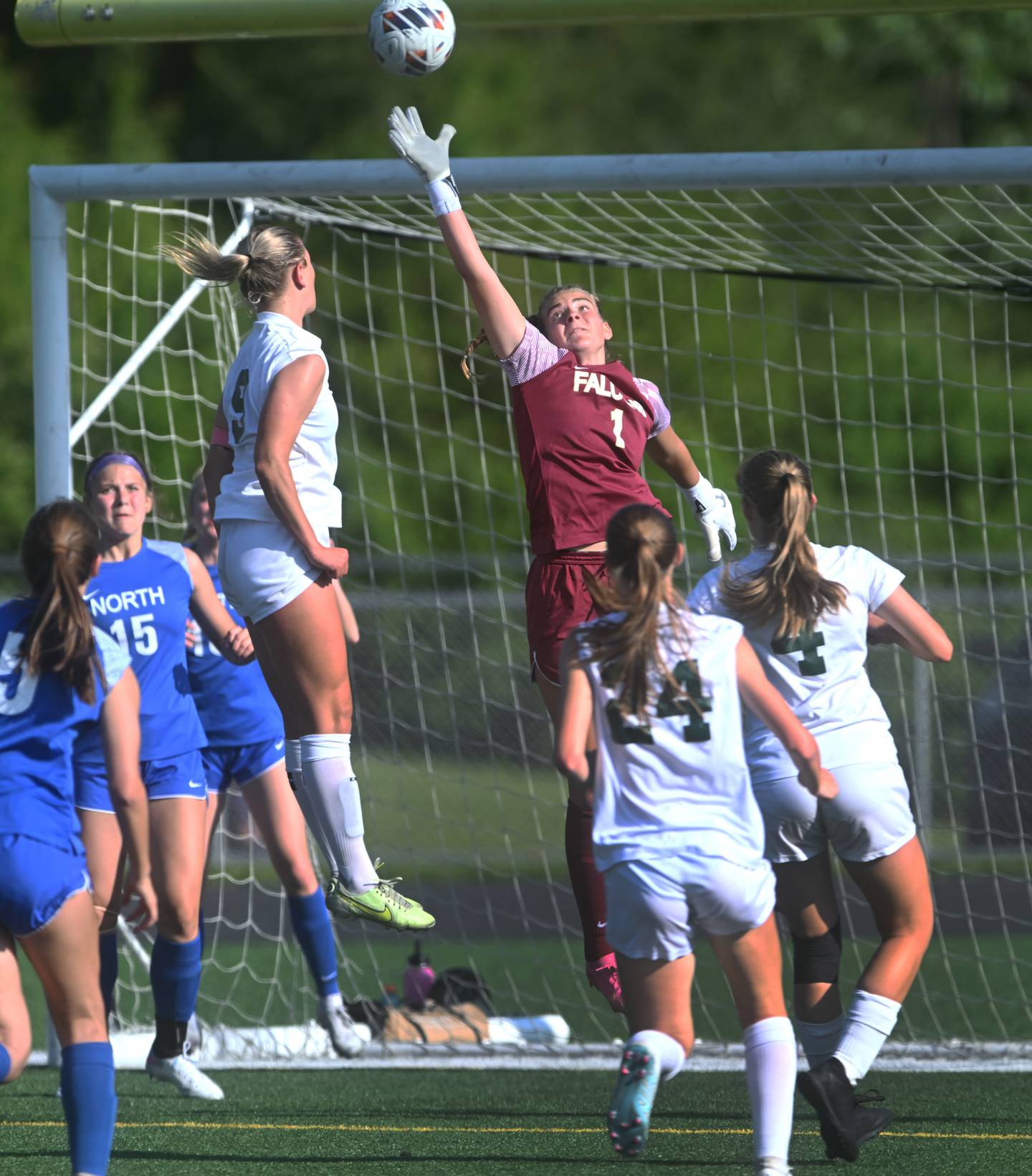 Wheaton North goalkeeper Zoey Bohmer (1) guards the net from a Glenbard West corner kick during the Class 3A regional soccer championship game on Friday, May 17, 2024 in Elgin.