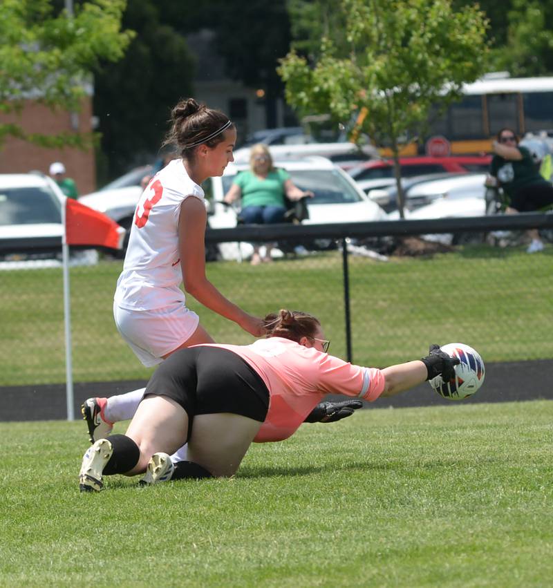 Oregon's Sarah Eckardt (left) chases the ball as Stillman Valley goalkeeper Sada Hughes knocks it away at the 1A Indian Creek Sectional on Saturday, May 18, 2024.