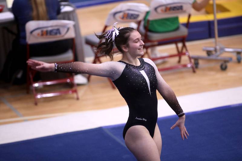 Lincoln-Way East’s Alaina Lekki competes on the floor exercise during the IHSA Girls State Gymnastics Meet at Palatine High School on Friday, Feb. 16, 2024.