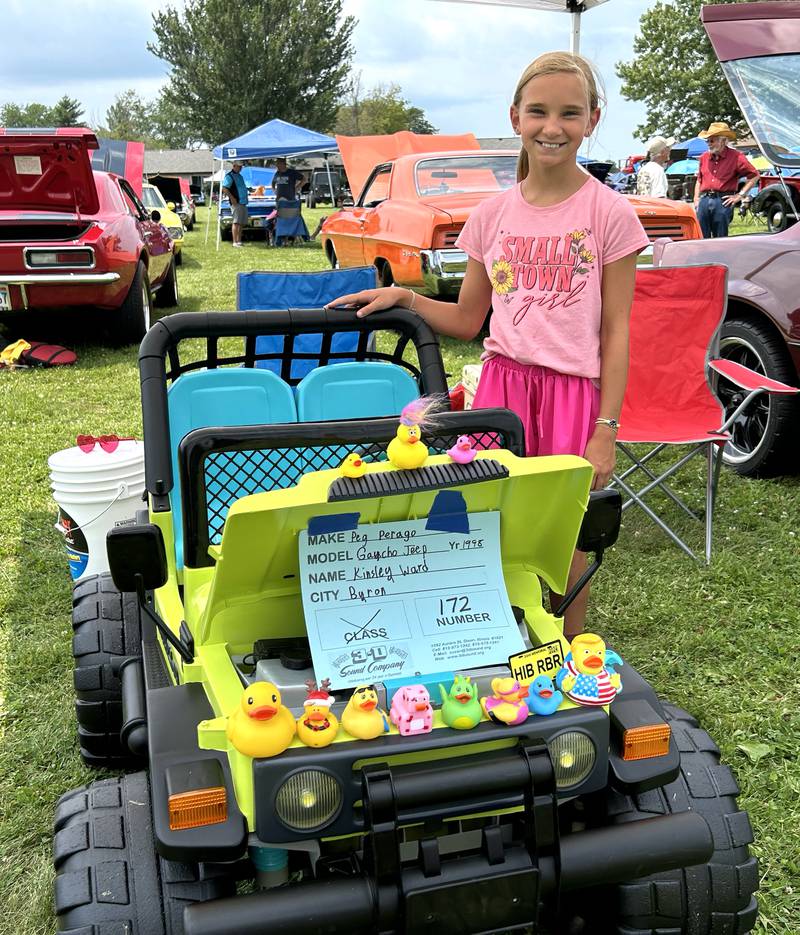 Kinsey Ward, 10, of Byron, entered her restored  1998 Gaucho Jeep in the Hib Reber Memorial Car Show held during ByronFest on Saturday, July 13, 2024 in Byron.