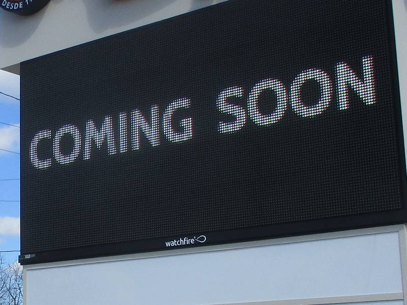An electronic sign on the edge of the El Guero parking lot tells Jackson Street motorists that the Joliet supermarket will open soon. March 23, 2024.
