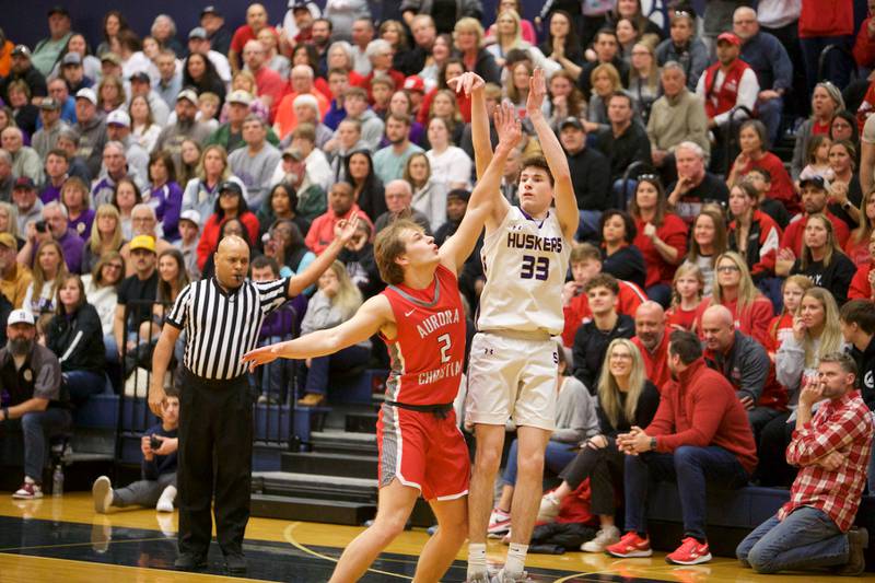 Serena's Hunter Staton shoots a three pointer against Aurora Christian at the Class 1A Boy's Basketball  Super Sectional on Friday , March 1, 2024 at Harvest Christian Academy  in Elgin.