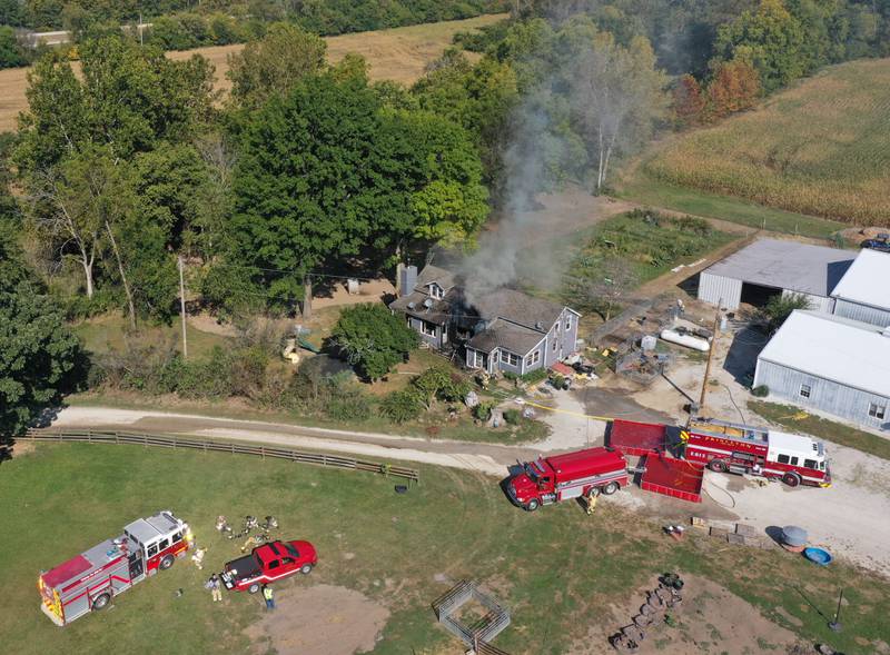 Smoke billows from a home in the 1300 block of 2500 East Street on Tuesday, Sept. 17, 2024 in rural Princeton Fire departments from eastern Bureau County were called to the scene just before 9:30a.m.