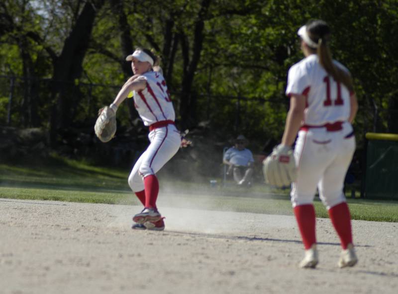 Oregon's Ella Dannhorn fires to first for an out against Rock Falls on Monday, May 6, 2024 in Rock Falls.