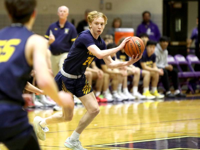 Neuqua Valley’s Colin Gerrity passes the ball during the Class 4A Downers Grove North Regional final against Downers Grove North on Friday, Feb. 23, 2024.
