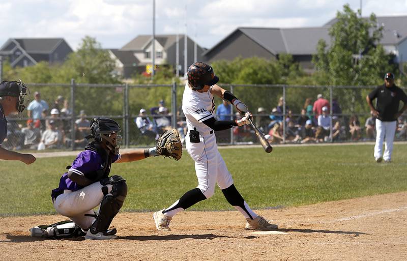 McHenry's Jack Stecker hits the ball to score two runs in the 6th inning during a Class 4A Hampshire sectional baseball game against Hampshire on Wednesday, May 29, 2024, at the Hampshire High School.