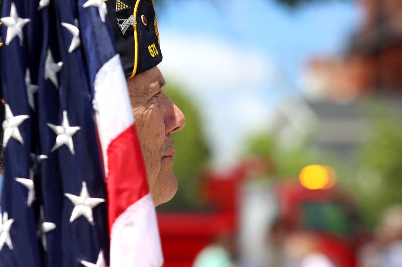 Tom Culumber of Huntley waits to present The Colors as part of the Huntley Memorial Day observance Monday. Culumber served in the Marines in Vietnam from 1963-1966.