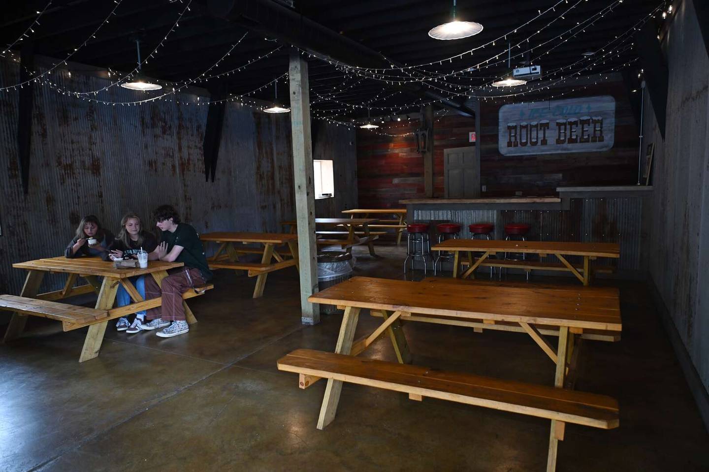 Interior seating in the barn at The Milk House in Pingree Grove.