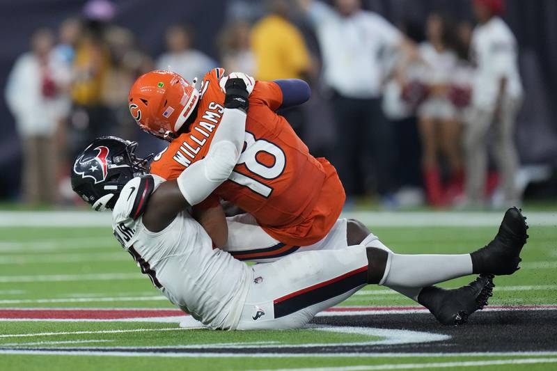 Chicago Bears quarterback Caleb Williams (18) is sacked by Houston Texans defensive end Will Anderson Jr. (51) during the second half of an NFL football game Sunday, Sept. 15, 2024, in Houston. (AP Photo/Eric Gay)