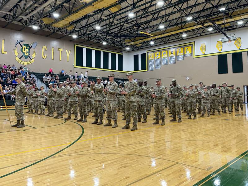 Bravo Company 766 standing in formation during the deployment ceremony held in Coal City on Thursday.