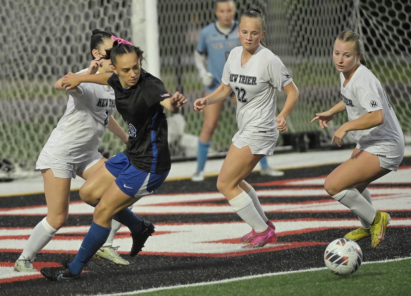 St. Charles North High School’s Laney Stark tracks down the ball before scoring her first goal of the game against Winnetka New Trier High School in the IHSA Class 3A championship game at North Central College in Naperville on Saturday, June 1, 2024.