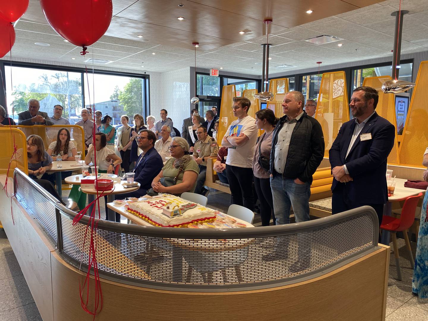 Full house of VIP guests listening to speakers at the reopening celebration May 30 for the Fox Lake McDonald's.