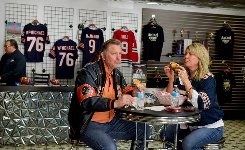 Randy and Susan Donley enjoys some pizza as they attend the Arcada Theatre’s “Mongo Bowl 23”, a Fundraiser for former Chicago Bears player Steve “Mongo” McMichael, who has ALS, on Sunday, Feb. 12, 2023.