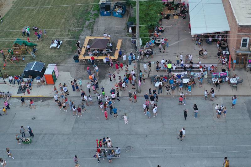 A large crowd gathers at Riverfront Bar and Grill along Water Street an hour before the  fireworks on Wednesday, July 3, 2024 in Peru.