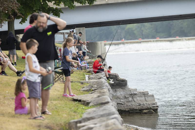 Over 50 kids signed up to participate in the Elk’s Club Fishing Derby Saturday, July 1, 2023 as part of Petunia Fest in Dixon. The anglers were lined up on the north side of the Rock River between the bridges to compete for trophies, fishing tackle and a new pole.