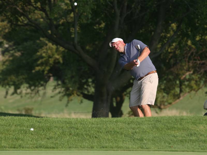 Josh Gass golfs on the 18th hole during the Illinois Valley Mens Golf Championship on Sunday, July 28. 2024 at Mendota Golf Club.