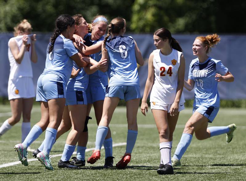 Willows Academy celebrates a goal against as Richmond-Burton's Ember Demers (24) looks on during the Class 1A Dominican super-sectional between Willows and Richmond-Burton HS in River Forest on Saturday, May 25, 2024.