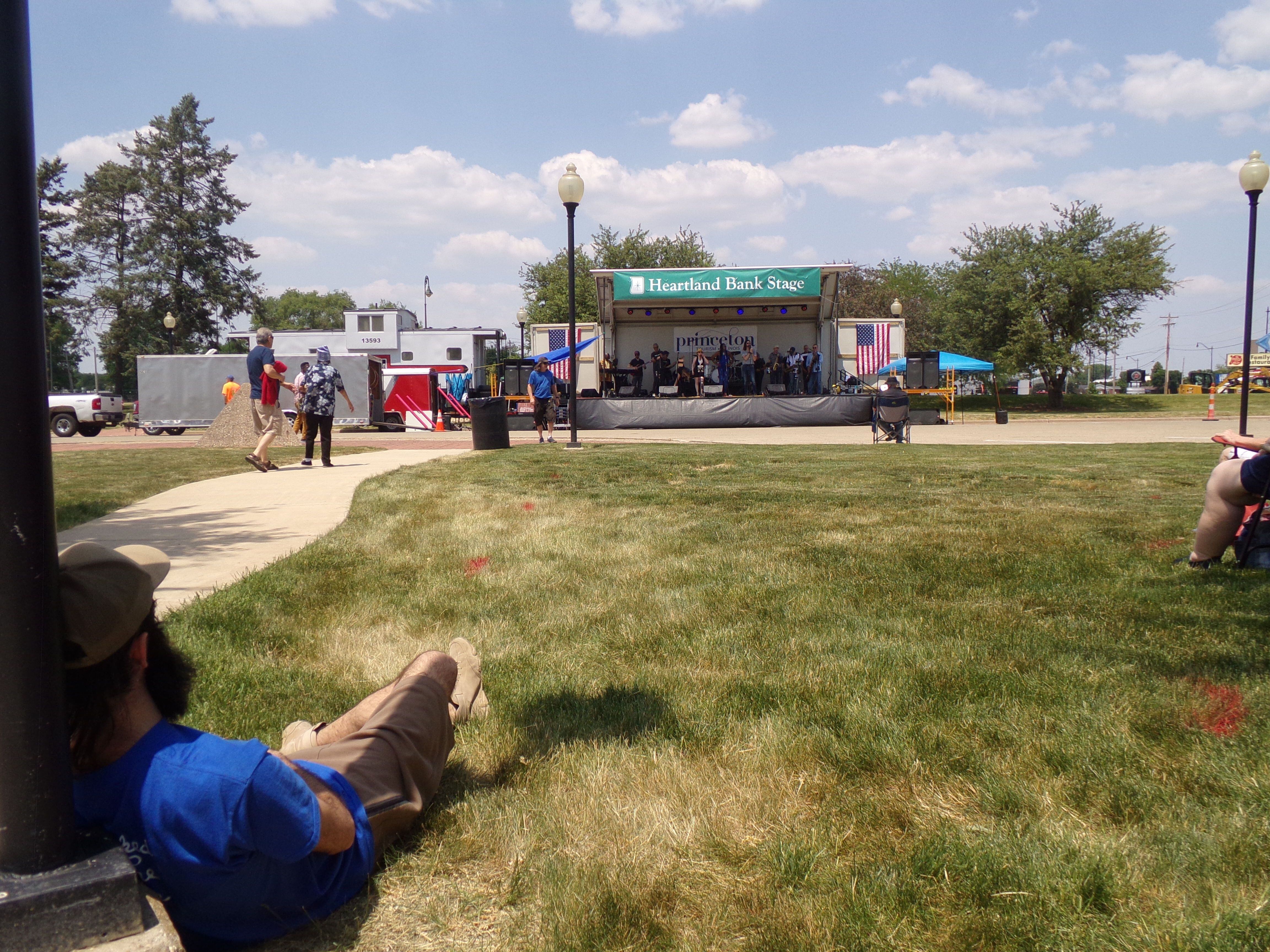 Spectators relax and enjoy the Brass from the Past on Saturday, June 3, 2023, during the Shrimp and Brew Hullabaloo at Rotary Park in Princeton.