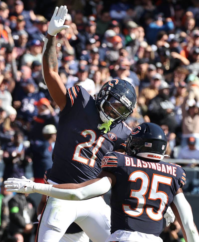 Chicago Bears running back D'Onta Foreman celebrates his touchdown with Chicago Bears fullback Khari Blasingame during their game against the Las Vegas Raiders Sunday, Oct. 22, 2023, at Soldier Field in Chicago.